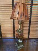 VINTAGE LAMP WITH METAL BASE AND EAGLE, WOODEN SHADE, APROX 2.5'H