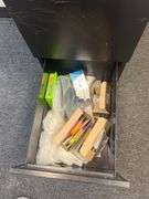 2-DRAWER BLACK METAL FILING CABINET APROX 15"x22"x27" FULL OF VARIOUS OFFICE SUPPLIES