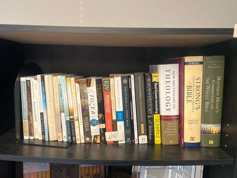 RELIGIOUS THEMED BOOKS INCLUDING NEW DICTIONARY OF THEOLOGY, STRONGS EXHAUSTIVE CONCORDANCE OF THE BIBLE, THE WISDOM OF GOF BY TOZER, OVERFLOW BY SPARKS, EXT