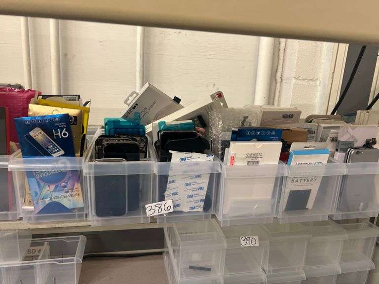 HUGE VARIETY OF IPHONE ACCESSORIES INCLUDING SCREEN PROTECTORS & REPLACEMENTS, REPLACEMENT BATTERIES, PHONE CASES, ACTUAL IPHONES IN PROCESS OF REPAIR, ETC