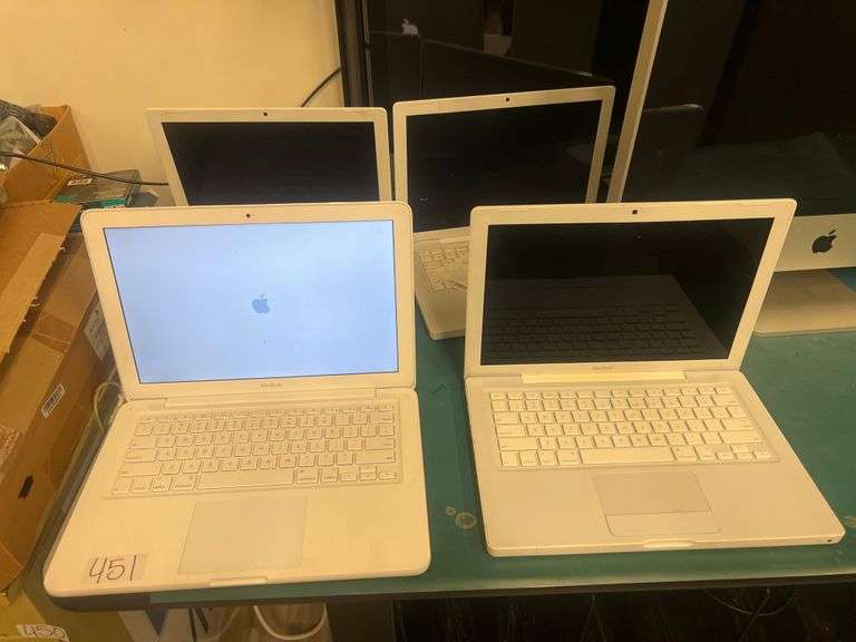 APPLE MACBOOK LAPTOPS A1342 & A1181 WITH SINGLE CHARGER INCLD.