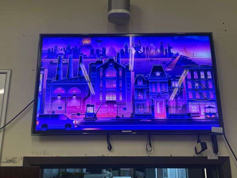 SAMSUNG ULTRA THIN TELEVISION APPROX 40" IN WORKING CONDITION WITH WALL MOUNT INCLD. **bring tools to remove from wall