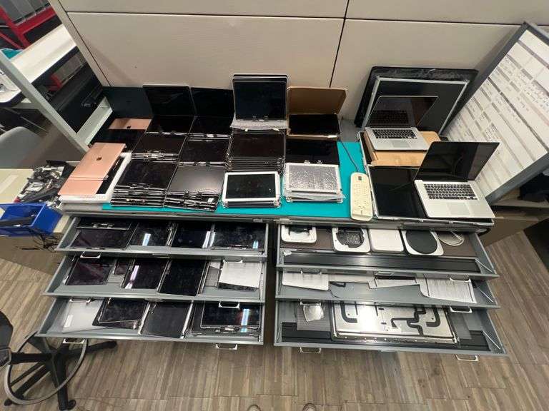 HUGE ASSORTMENT OF APPLE LAPTOP SCREENS INCLUDING SOME FULL LAPTOPS IN LOT, SOLD PER SCREEN lot includes everything on top of and inside of filing cabinets