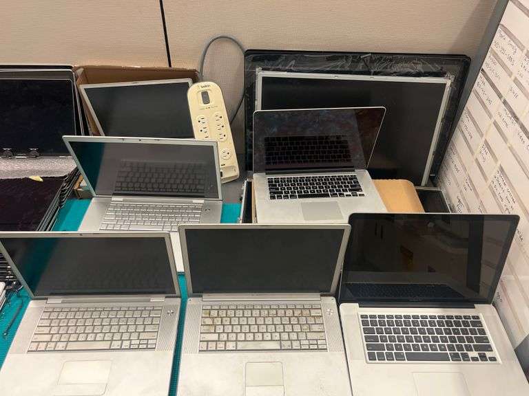 HUGE ASSORTMENT OF APPLE LAPTOP SCREENS INCLUDING SOME FULL LAPTOPS IN LOT, SOLD PER SCREEN lot includes everything on top of and inside of filing cabinets