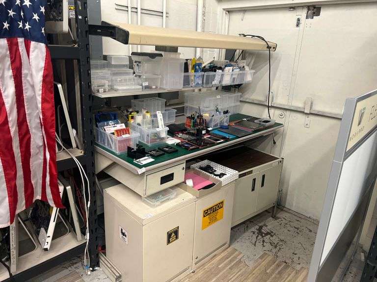 IAC INDUSTRIES TALL WORKBENCH WITH ADJUSTABLE OVERHEAD LAMP, AND MULTIPLE 120V OUTLETS, APPROX 6' x 3' x 6'