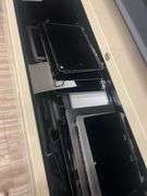 HUGE ASSORTMENT OF APPLE LAPTOP SCREENS INCLUDING SOME FULL LAPTOPS IN LOT, SOLD PER SCREEN lot includes everything on top of and inside of filing cabinets