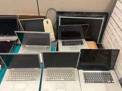 HUGE ASSORTMENT OF APPLE LAPTOP SCREENS INCLUDING SOME FULL LAPTOPS IN LOT, SOLD PER SCREEN lot includes everything on top of and inside of filing cabinets