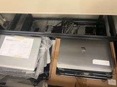 HUGE ASSORTMENT OF APPLE LAPTOP SCREENS INCLUDING SOME FULL LAPTOPS IN LOT, SOLD PER SCREEN lot includes everything on top of and inside of filing cabinets