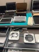 HUGE ASSORTMENT OF APPLE LAPTOP SCREENS INCLUDING SOME FULL LAPTOPS IN LOT, SOLD PER SCREEN lot includes everything on top of and inside of filing cabinets