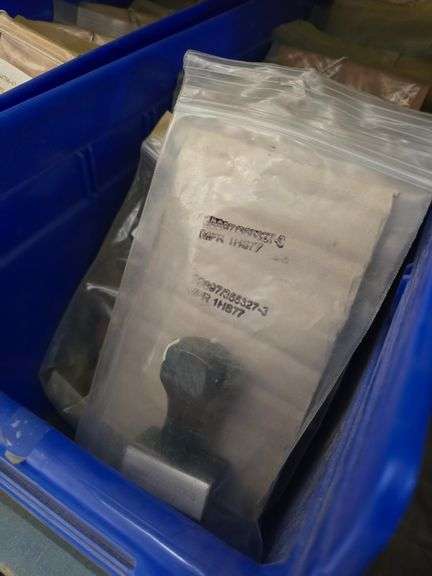 RUBBER STAMPS EACH ORGANIZED IN BLUE PLASTIC ORGANIZERS, WITH 3-TIER BLUE WAREHOUSE SHELF INCLD.