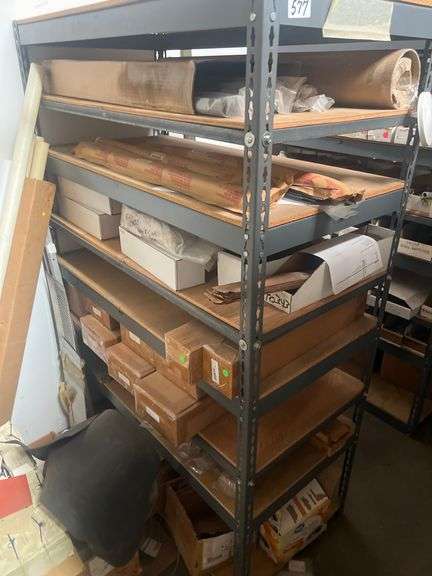 LARGE ASSORTMENT OF SCREW NUT BOLT AND PARTS HARDWARE 1000S OF PIECES IN THIS LOT COMES WITH ALL BINS AND SHELVING SOLD BY THE RACK