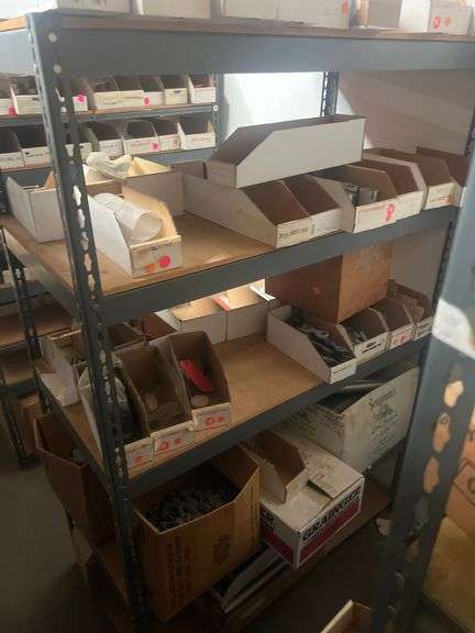 LARGE ASSORTMENT OF SCREW NUT BOLT AND PARTS HARDWARE 1000S OF PIECES IN THIS LOT COMES WITH ALL BINS AND SHELVING SOLD BY THE RACK