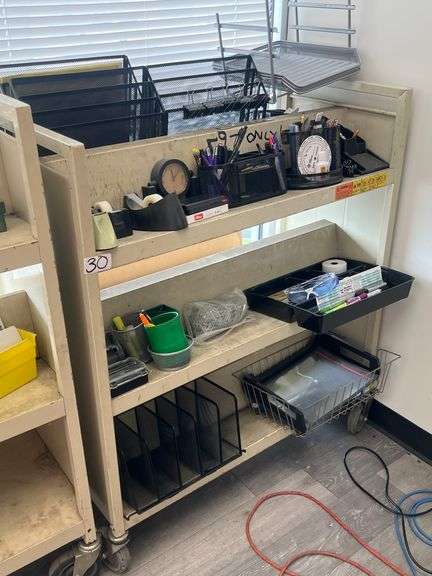 DUAL SIDED METAL BOOK CART TOTAL SIZE APROX 37"x18"x42" WITH A WIDE ARRAY OF OFFICE SUPPLIES INCLD.