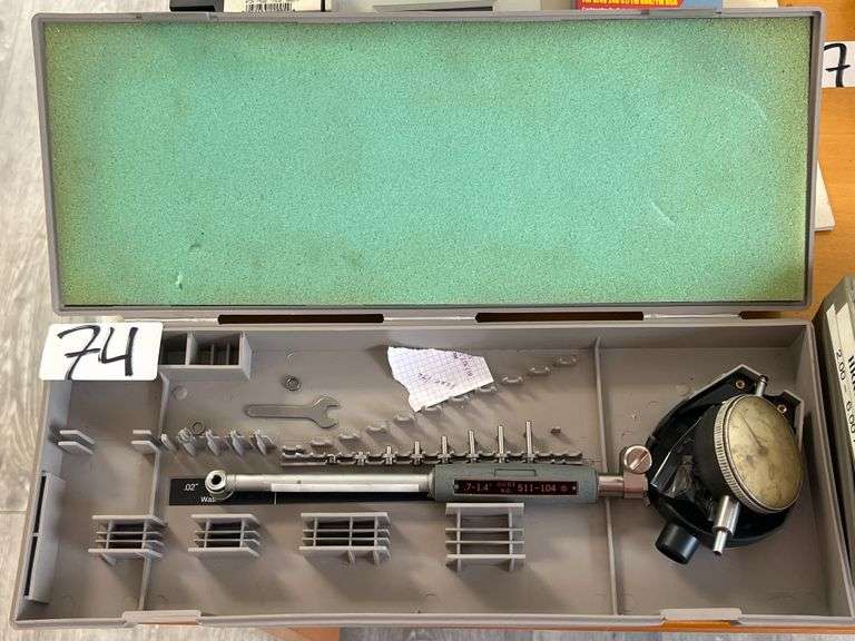 MITUTOYO 511-104 PRECISION MICROMETER .7-1.4" WITH 999-380 .001-1.000" GAGE AND VARIOUS ATTACHMENTS IN PLASTIC CASE