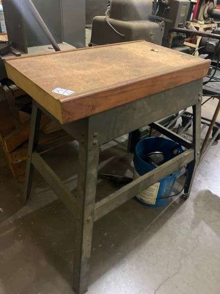 WORK BENCH WITH SOLID WOODEN TOP AND METAL BOTTOM APROX 29"x16"x3'