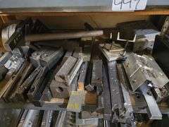 PLASTIC INJECTION DIE MOLDS IN A VARIETY OF SIZES AND SHAPES WITH DROP IN SHELVING UNIT INCLD.