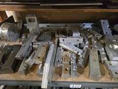 PLASTIC INJECTION DIE MOLDS IN A VARIETY OF SIZES AND SHAPES WITH DROP IN SHELVING UNIT INCLD.