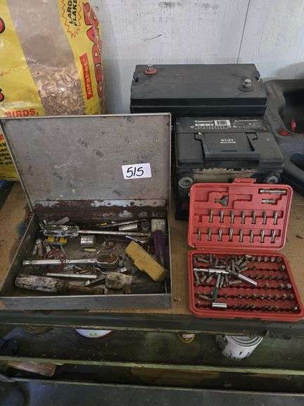 CONTENTS OF SHELF INCLUDING BIT SET OIL PANS CEDAR SHAVINGS PAINT BATTERIES ECT