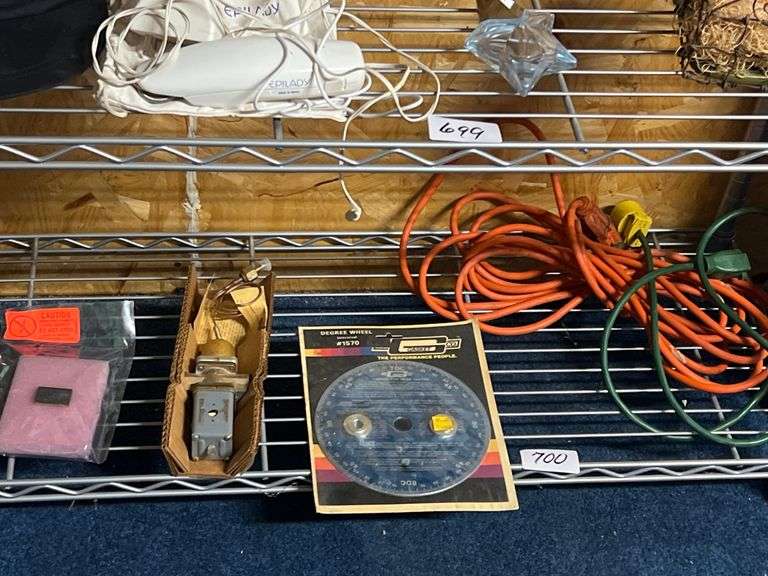 contents of shelf including degree wheel #1570, extension cables ect