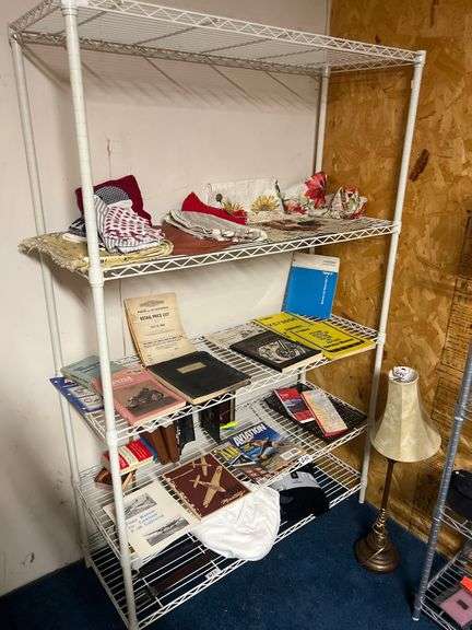 white metal metro style shelving unit with 5-shelves