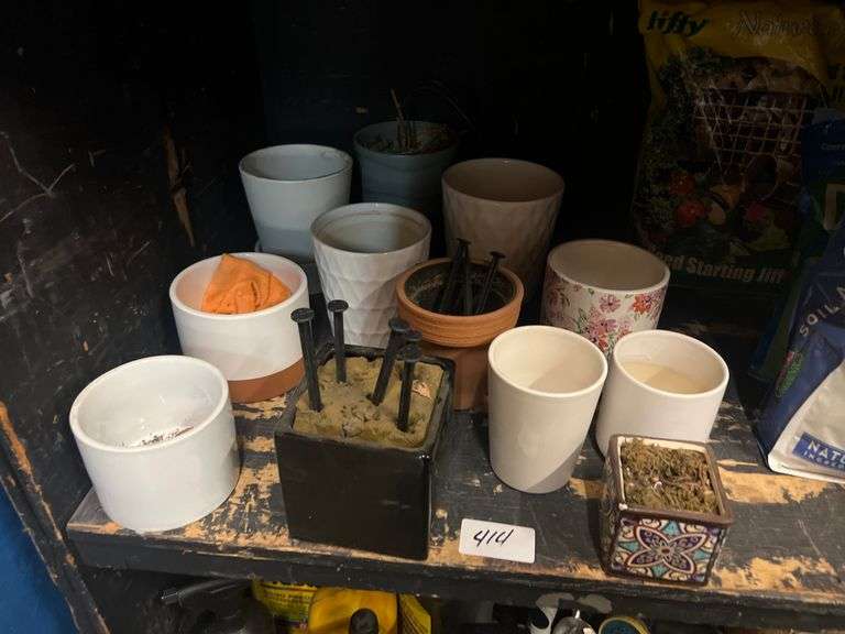 CERAMIC PLANTERS IN A VARIETY OF SMALL SIZES NO BIGGER THAN 6"