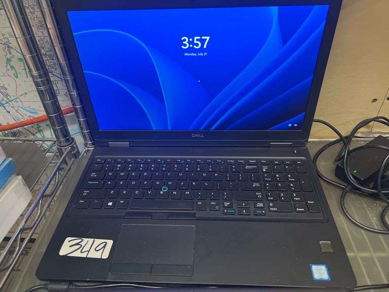 DELL LATITUDE 5580 LAPTOP POWERS ON, LOCKED WITH CHARGER INCLD.