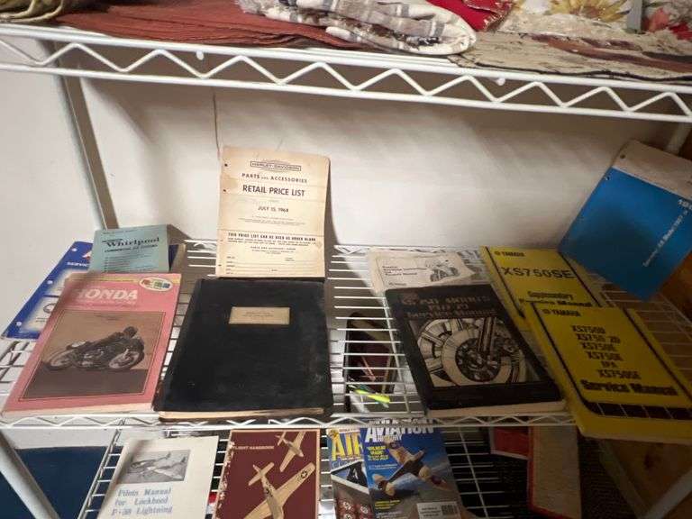 vintage manuals including Honda motorcycle, pilot's manual for Lockheed p-38 lightning, 1968 Harley Davidson retail price list, ect
