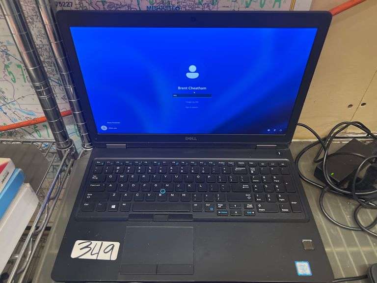 DELL LATITUDE 5580 LAPTOP POWERS ON, LOCKED WITH CHARGER INCLD.