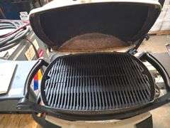 WEBER PORTABLE PROPANE GRILL WITH COOKBOOK, SKEWERS, AND SMALL PROPANE TANK INCLD.