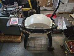 WEBER PORTABLE PROPANE GRILL WITH COOKBOOK, SKEWERS, AND SMALL PROPANE TANK INCLD.