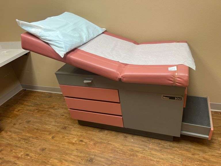 RITTER 104 EXAM TABLE WITH STIRRUPS & 5-DRAWERS FULL OF VARIOUS SUPPLIES APROX 53"x27"x44"