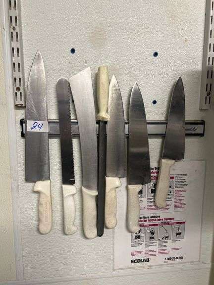 MUNDIAL MAGNETIC WALL STRIP WITH (6) COMMERCIAL KNIVES AND KNIFE SHARPENER INCLD. *BUYER RESPONSIBLE FOR REMOVAL FROM WALL