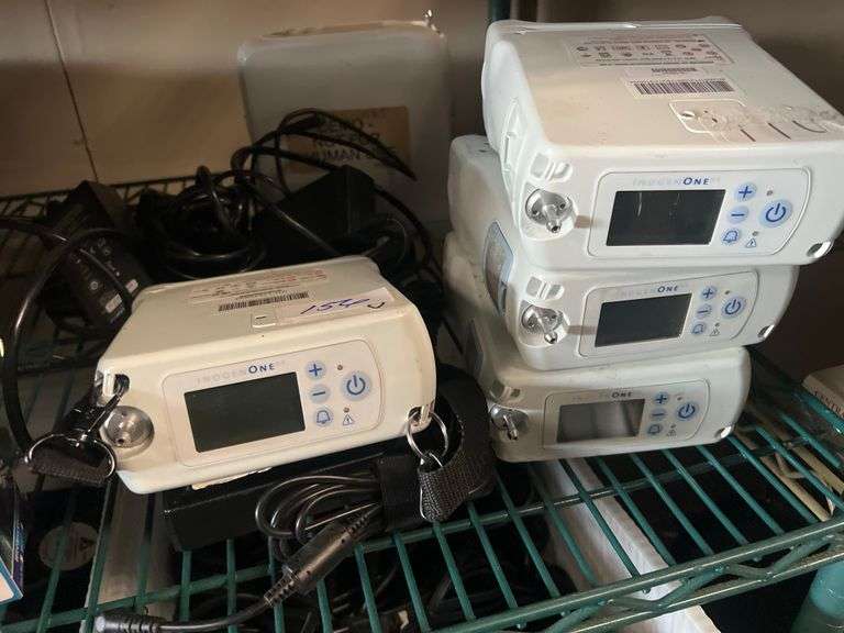 INOGEN ONE G4 OXYGEN CONCENTRATORS EACH WITH BATTERY (3) AC ADAPTERS IN LOT