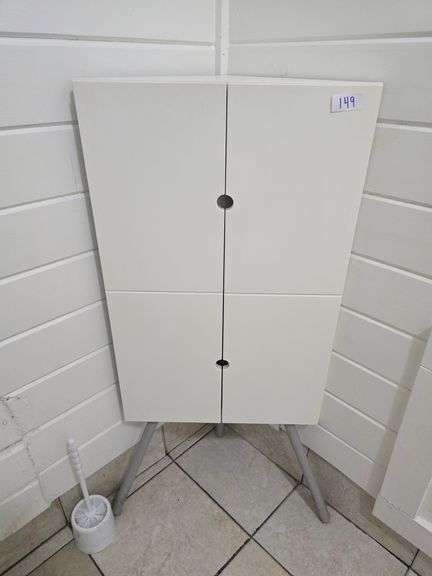CORNER CABINET WITH 2-DOORS, 2-INNER TIERS VARIOUS SUPPLIES INCLD. APROX 4'H x 20"FRONT