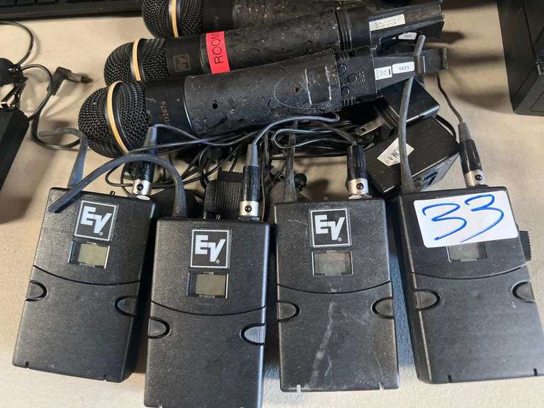 EV ELECTRO VOICE BPU-2 UHF BELTPACK TRANSMITTER EACH WITH CHARGING CABLE AND (3) EV D267A BATTERY OPERATED MICS INCLD.