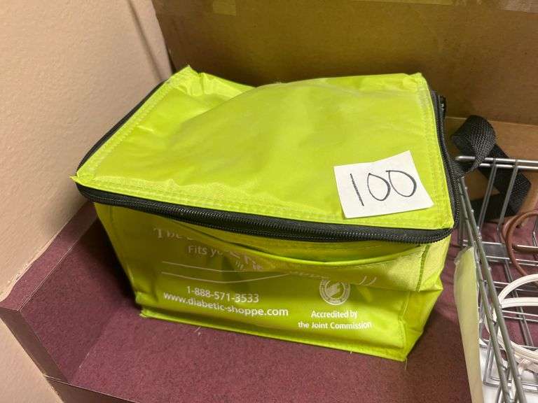 THE DIABETIC SHOPPE BAG WITH VARIOUS SUPPLIES INCLUDED INSIDE