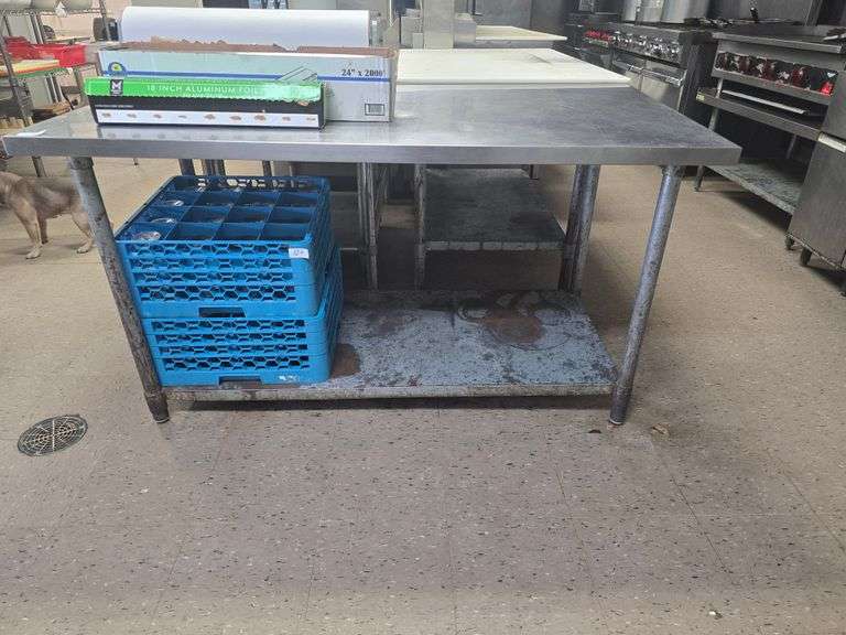 STAINLESS STEEL COMMERCIAL FOOD PREP TABLE APROX 5'x 30" x 33"