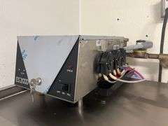 ECOLAB ES-2000 COMMERCIAL DISHWASHING MACHINE WITH NSF METAL ATTACHMENTS INCLUDED AS WELL AS (4) TRAYS.. **TOOLS LIKELY NEEDED FOR REMOVAL, BUYER RESPONSIBLE FOR DISCONNECT
