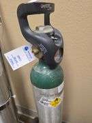 MATHESON COMPRESSED OXYGEN TANKS 2-LARGER ONES READ FULL, SINGLE OXYTOTE INCLUDED