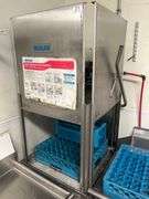 ECOLAB ES-2000 COMMERCIAL DISHWASHING MACHINE WITH NSF METAL ATTACHMENTS INCLUDED AS WELL AS (4) TRAYS.. **TOOLS LIKELY NEEDED FOR REMOVAL, BUYER RESPONSIBLE FOR DISCONNECT
