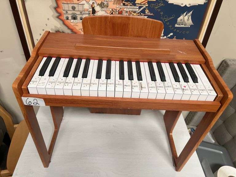 KIDS BATTERY OPERATED WOODEN MINI PIANO WITH NOTE GUIDES ON EACH KEY APROX 22"x1'x19"