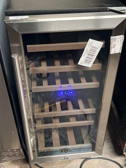 TYLZA BUILT-IN WINE COOLER MODEL TYWC100 WITH MANUAL INCLD. NEVER USED BUT WITH MINOR COSMETIC DAMAGE