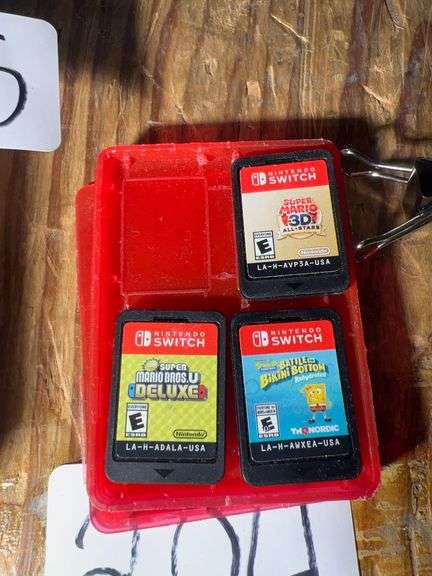NINTENDO SWITCH GAMES INCLD. SPONGEBOB BATTLE BIKINI BOTTOM, SUPER MARIO BROS U DELUXE AND 3D ALL STARS, WITH CARRYING CASE INCLD.