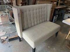 MODERN UPHOLSTERED BOOTH SEATING APROX 46"x25"x39" WITH METAL BUTTON ACCENT AND BLACK WOODEN LEGS