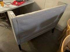 MODERN UPHOLSTERED BOOTH SEATING APROX 46"x25"x39" WITH METAL BUTTON ACCENT AND BLACK WOODEN LEGS