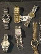 VARIETY OF DESIGNER METAL LINK WATCHES INCLUDING CITIZEN, RALPH VALENTINE, GIANI-GIORGIO, ECT