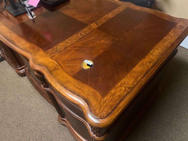 SOLID CHERRY WOOD EXECUTIVE DESK WITH BEAUTIFUL CARVED DESIGNS, 4-DRAWERS AND CABINET WITH PULL OUT SHELVES APROX 6'x3'x32" MATCHES LOT 30, 34 & 35