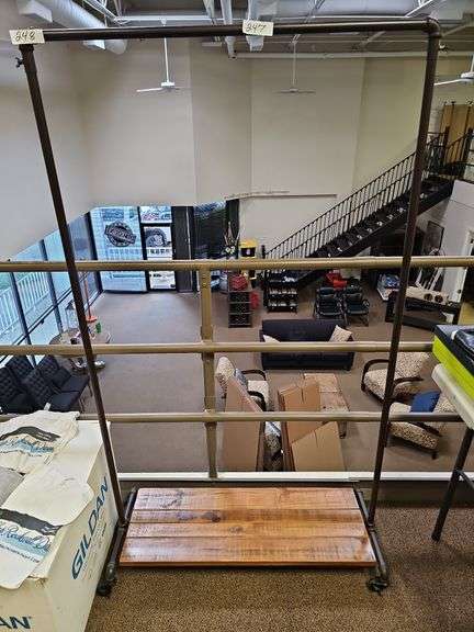 RUSTIC CUSTOM MADE ROLLING CLOTHING RACK WITH METAL PIPE SUPPORTS AND SOLID WOOD SHELVES APROX 40"x16"x68"