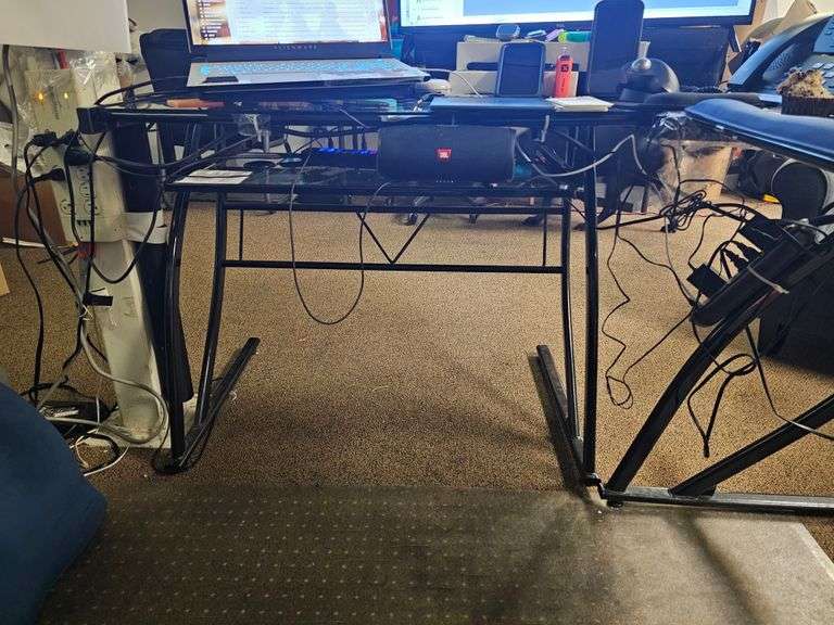 GLASS TOPPED METAL L-SHAPED OFFICE DESK WITH SINGLE SHELF, APROX 4'x4'x3' **Need tools for disassembly