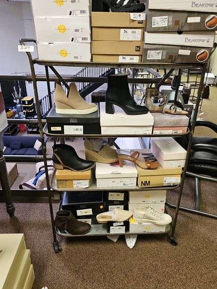 COPPER COLORED METAL SHELVING UNIT ON WHEELS APROX 3'x15"x52"
